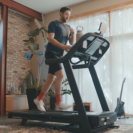 Man running on Horizon Treadmill